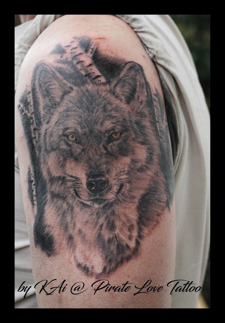 a wolf blackwork tattoo on the arm, reutlingen, germany
