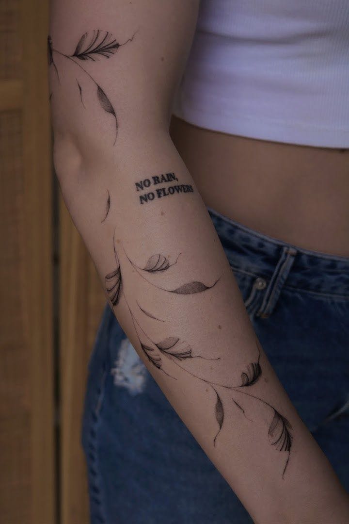 a woman with a narben tattoo on her arm, emsland, germany