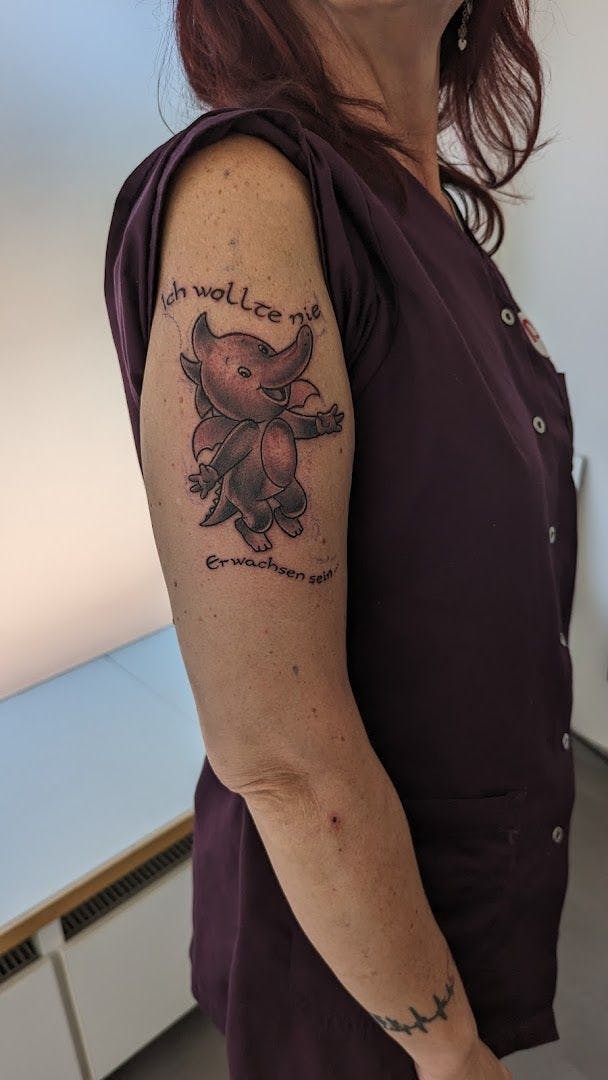 a woman with a japanische tattoos in leipzig on her arm, bad dürkheim, germany