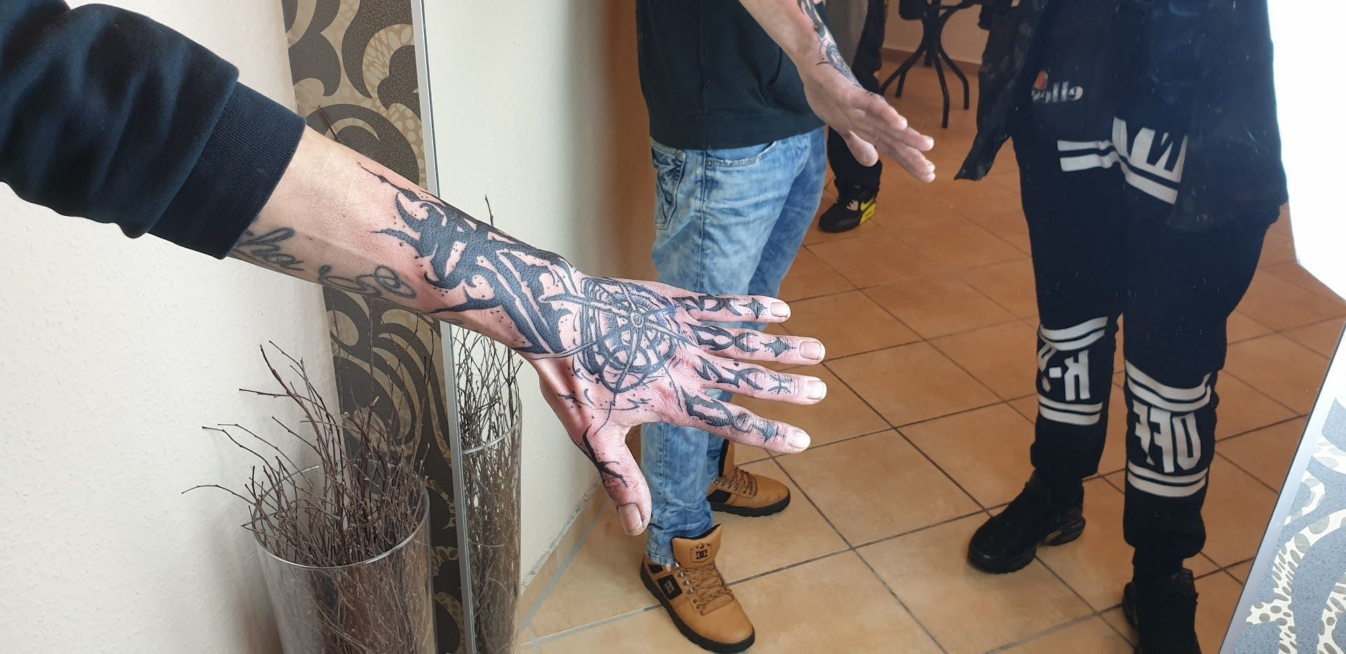 a man with a narben tattoo on his hand, cuxhaven, germany