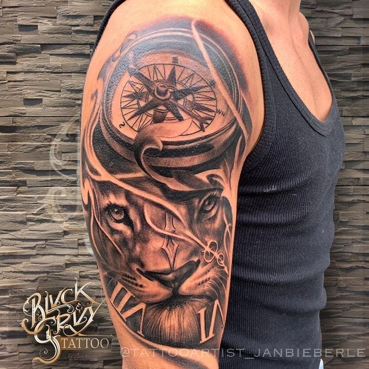a man with a clock cover-up tattoo on his arm, hamburg, germany