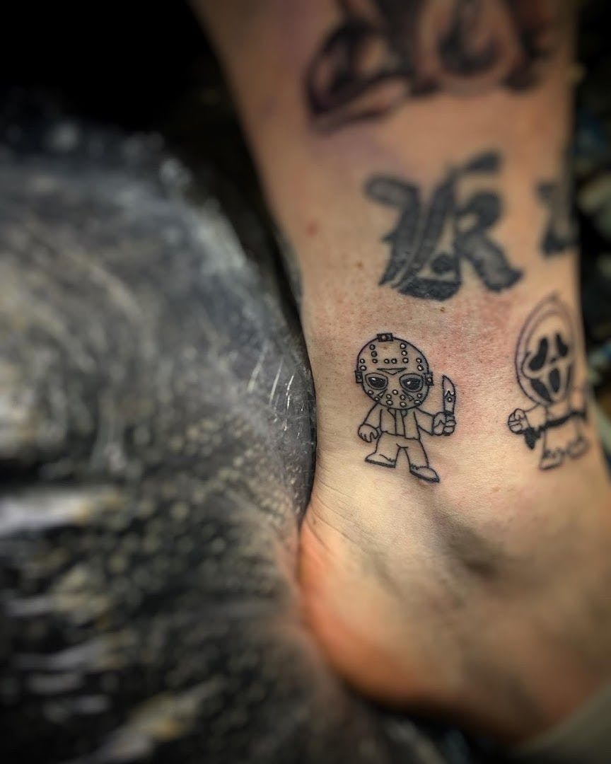 a cover-up tattoo on the foot of a man, oldenburg, germany