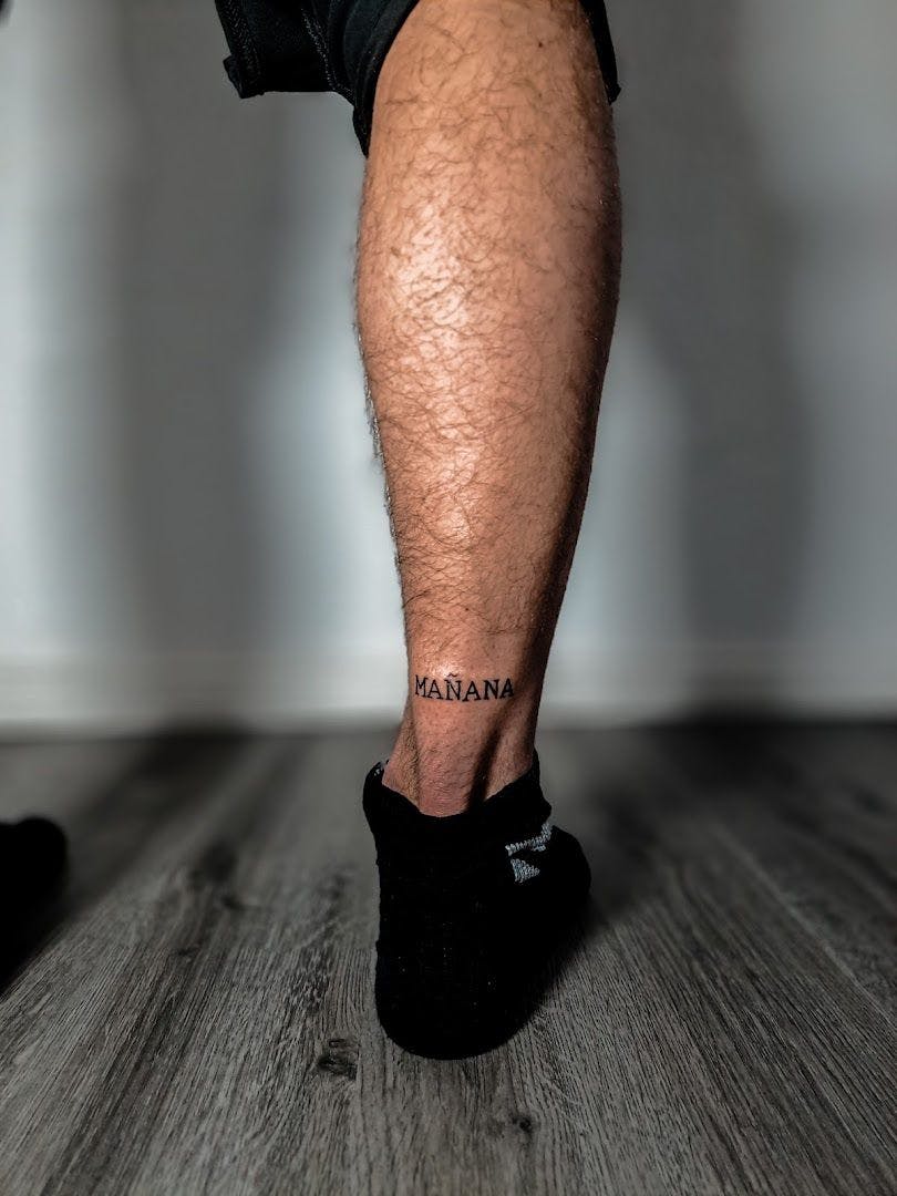 a man with a japanische tattoos in leipzig on his leg, coburg, germany
