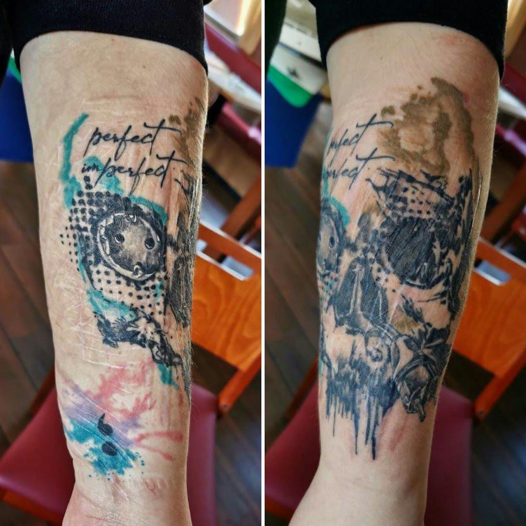 a narben tattoo artist's arm with a watercolor painting on it, kreisfreie stadt gera, germany