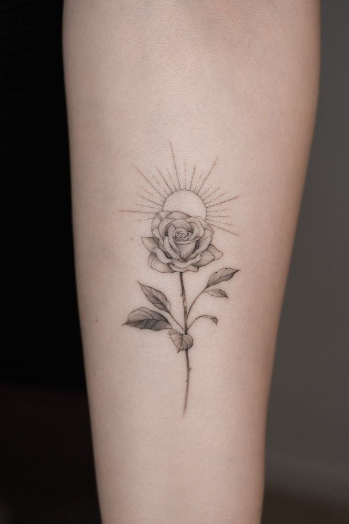 a rose narben tattoo on the arm, berlin, germany