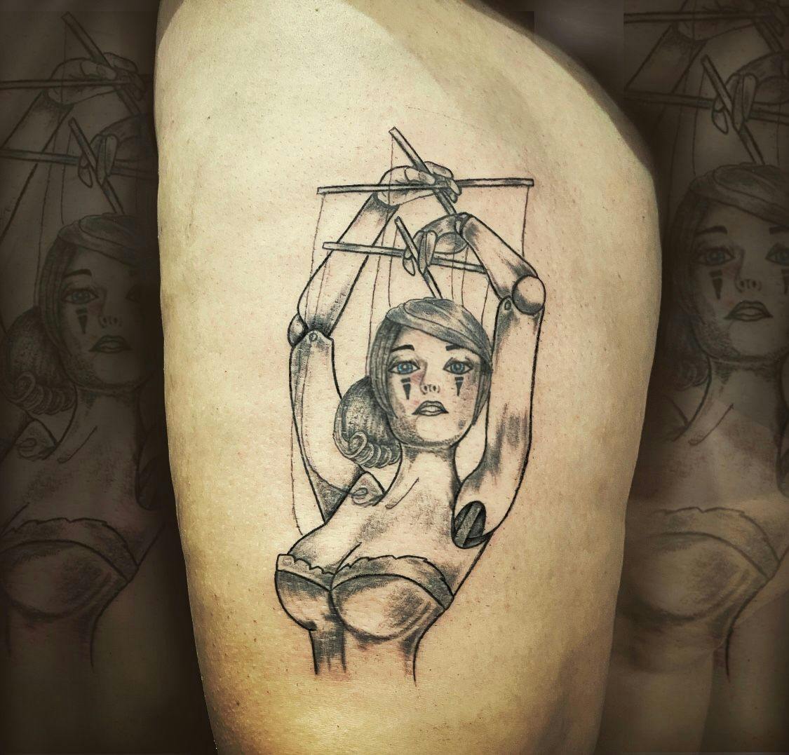 a narben tattoo of a woman holding a sword, enzkreis, germany
