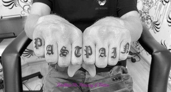 a man with narben tattoos on his hands, hamburg, germany