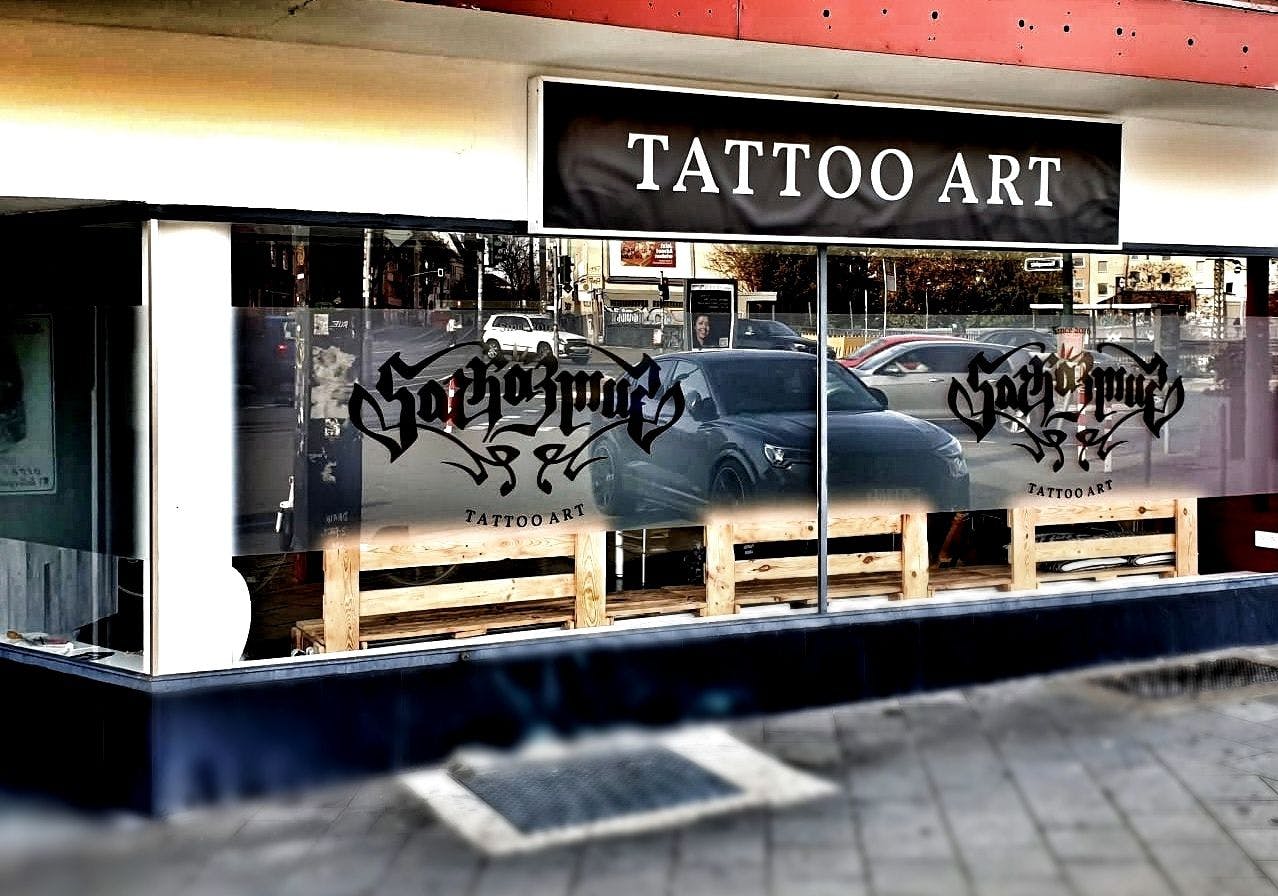 a store with graffiti on the front of it