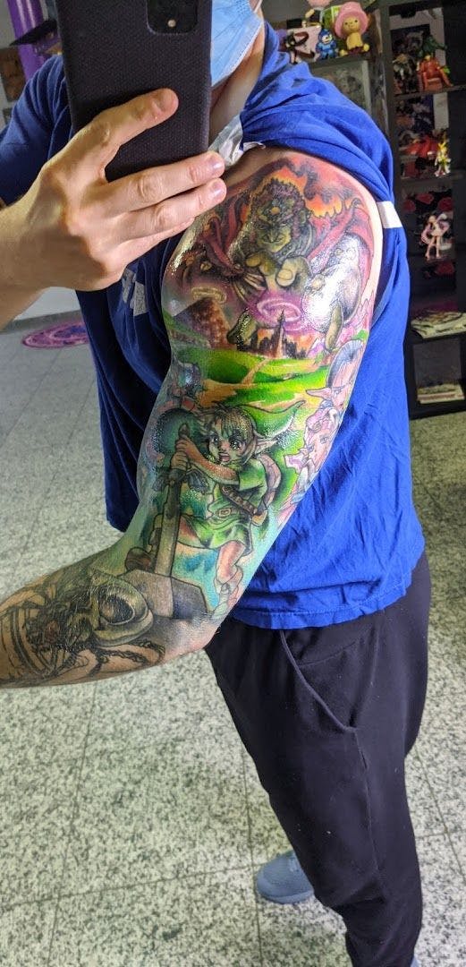 a man with a japanische tattoos in leipzig on his arm, rhein-sieg-kreis, germany