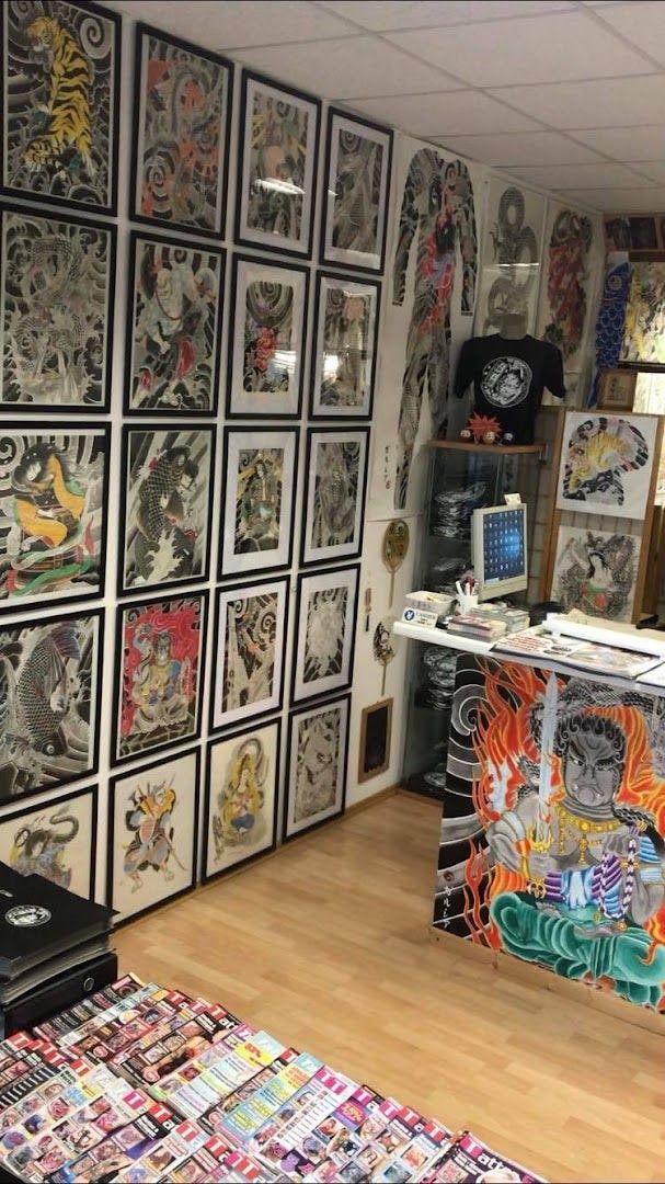 a room with lots of japanische tattoos in leipzigs and other items, düsseldorf, germany