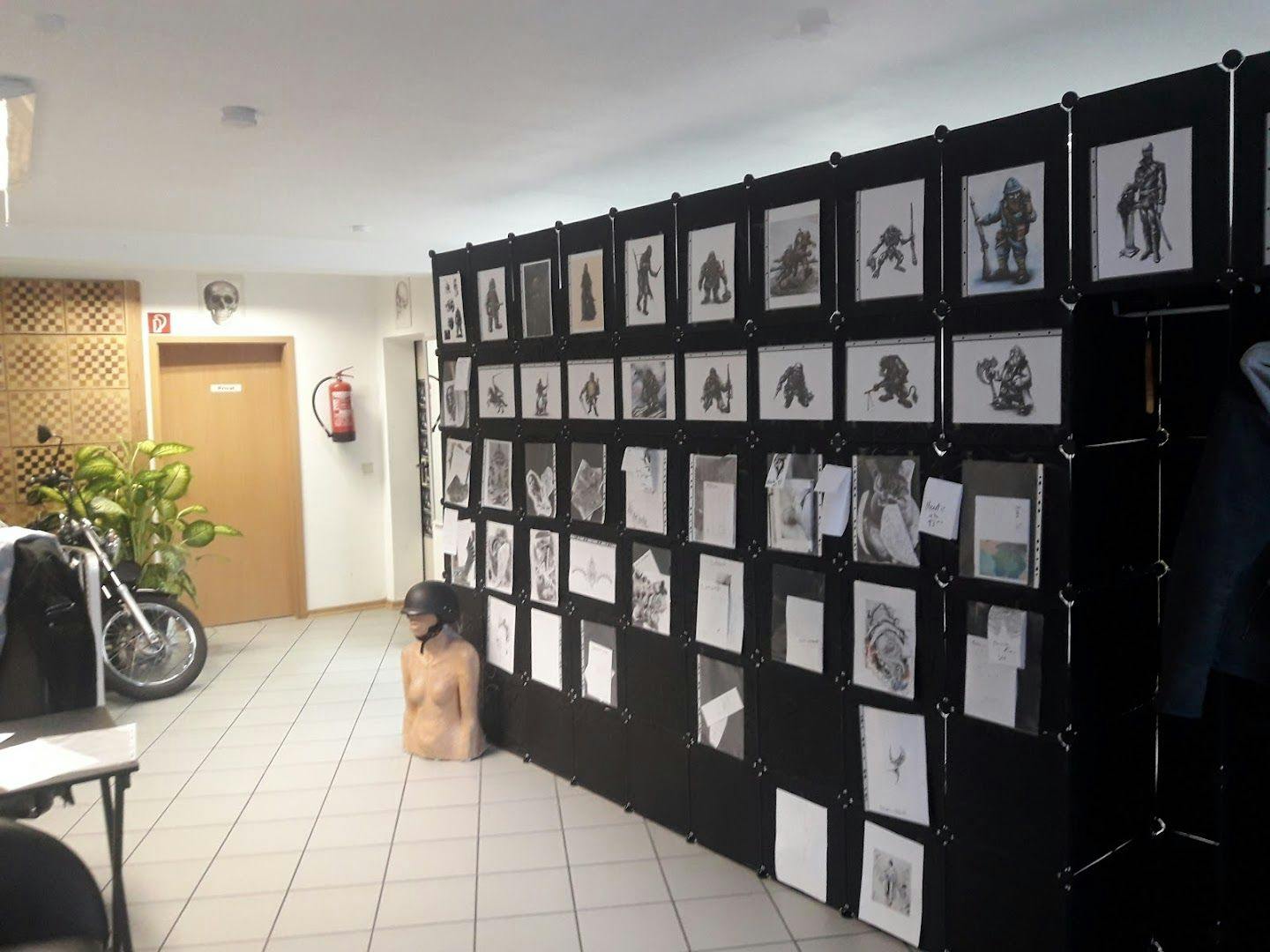 a wall with pictures and pictures on it