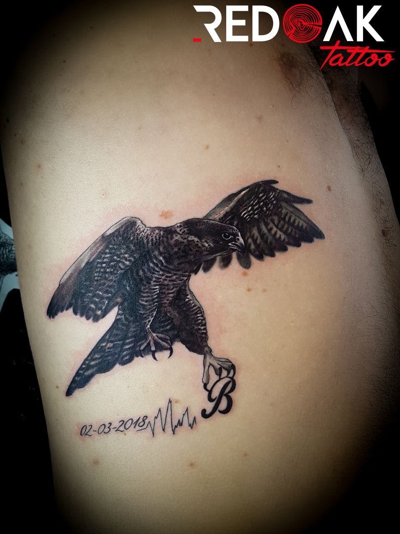 a cover-up tattoo of an eagle with a heart on it, viersen, germany