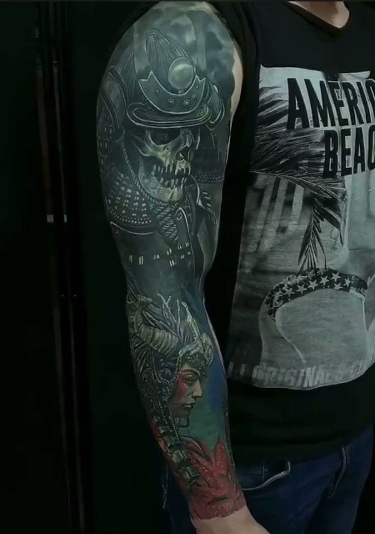 a man with a japanische tattoos in leipzig on his arm, kleve, germany