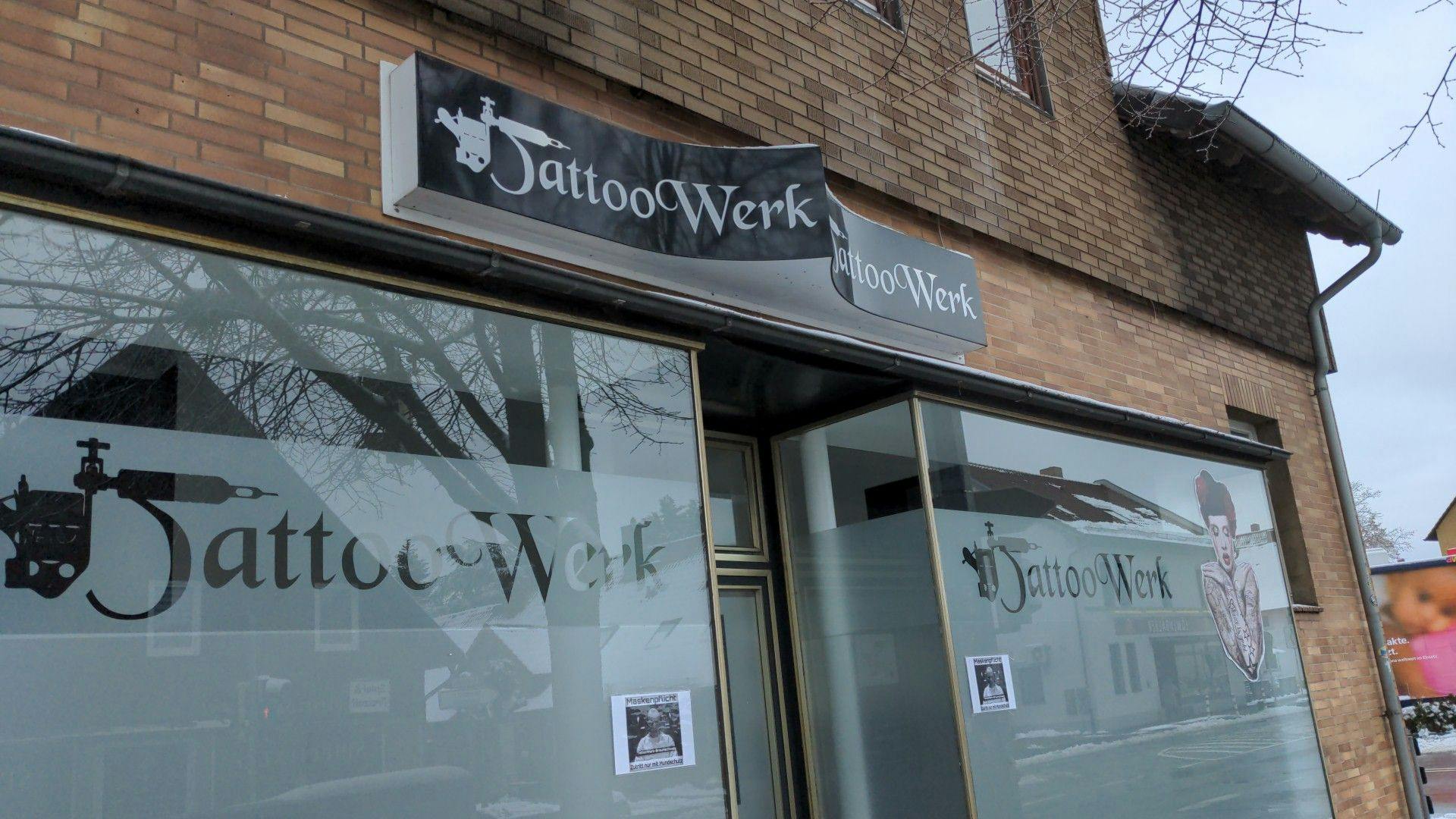a store front with a sign that says'out work '