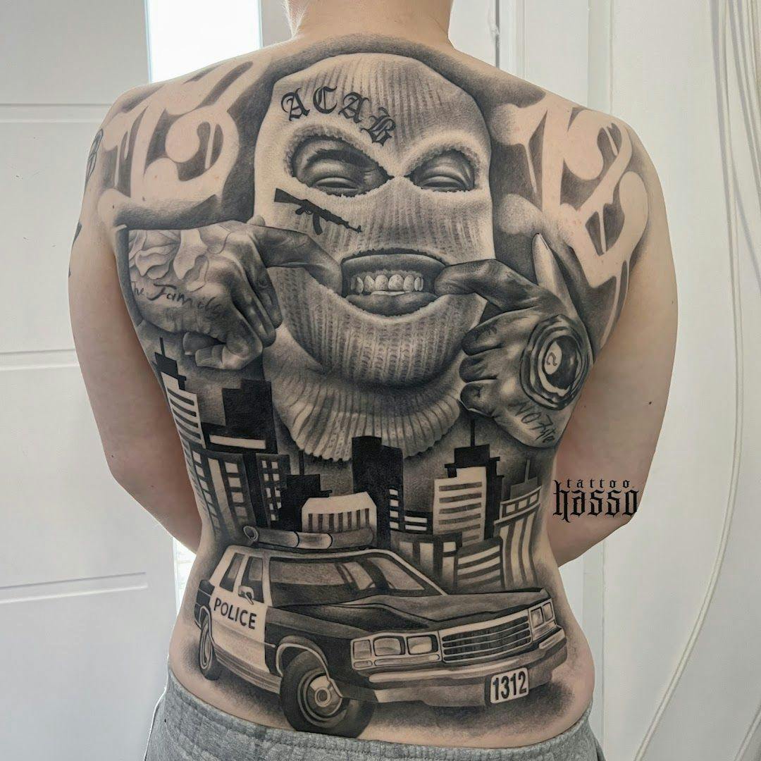 a man with a cover-up tattoo on his back, berlin, germany