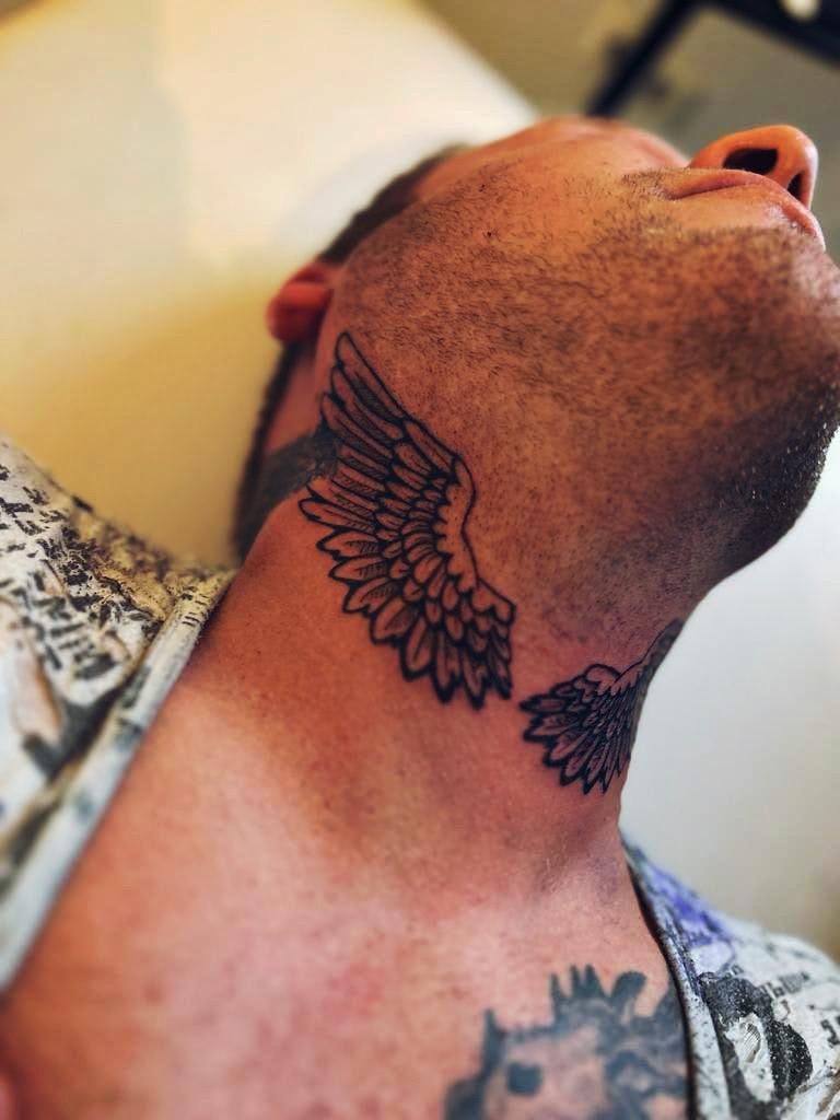 a man with a narben tattoo on his neck, biberach, germany