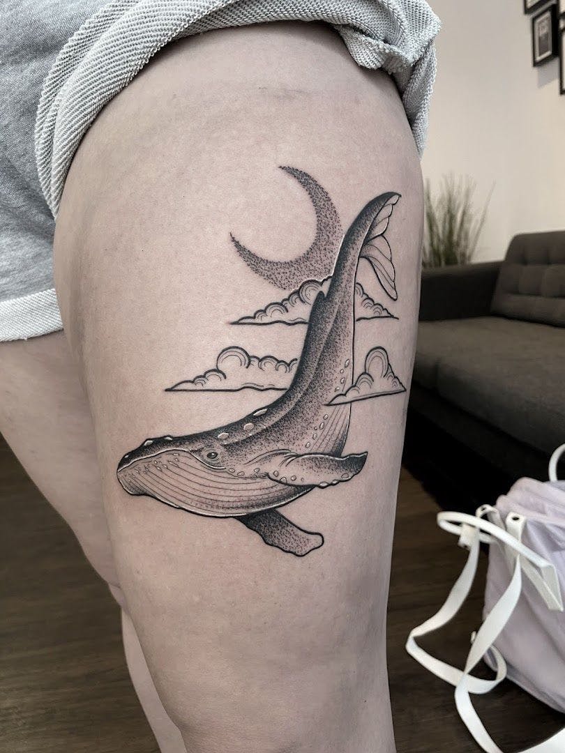 a whale narben tattoo on the thigh, düsseldorf, germany