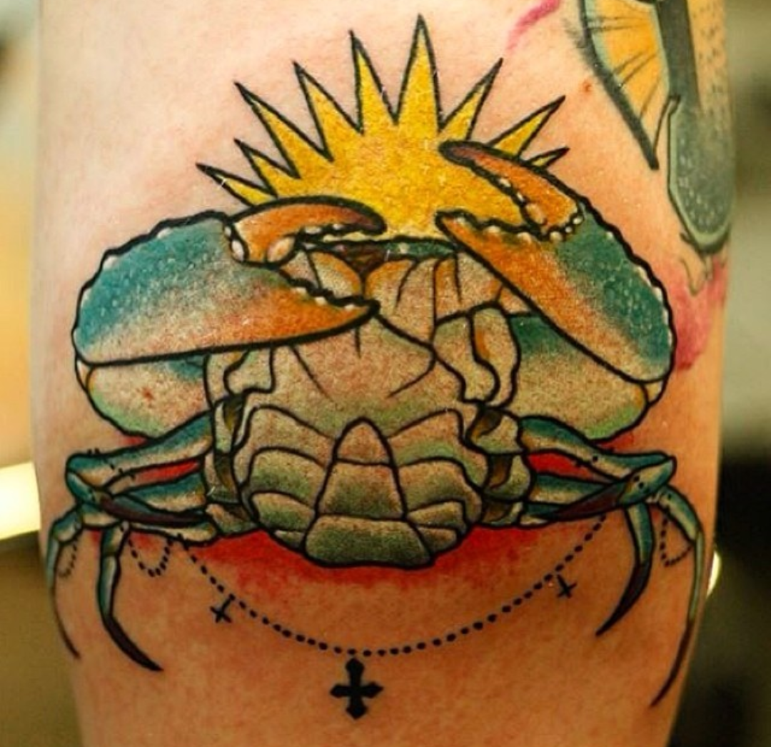 a cover-up tattoo with a crab on it, berlin, germany