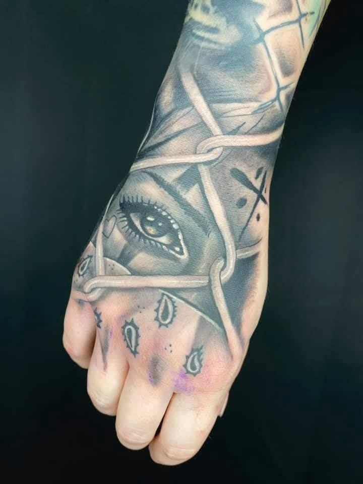 a hand with a narben tattoo on it, osterholz, germany