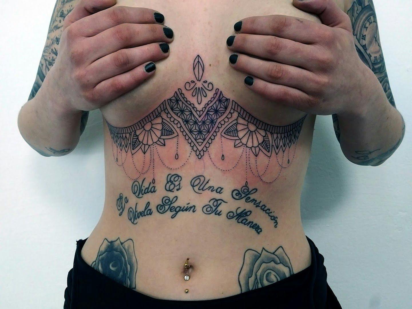 a woman with japanische tattoos in leipzigs on her chest, aschaffenburg, germany