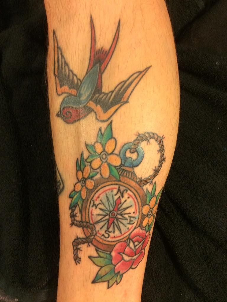 a narben tattoo with a bird and a compass on it, marburg-biedenkopf, germany