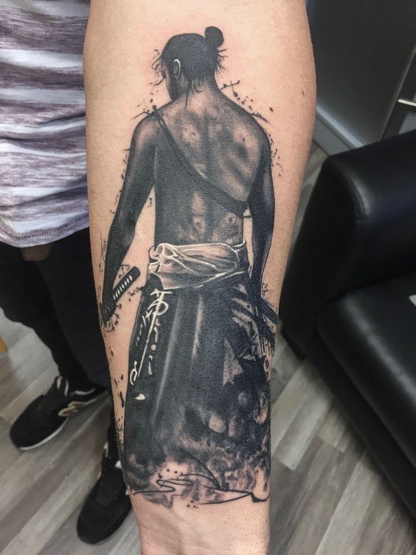a cover-up tattoo of a woman with a black and white ink, erlangen-höchstadt, germany