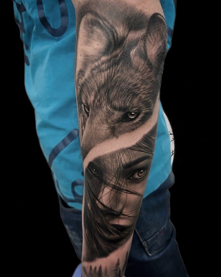 a man's arm with a wolf portrait tattoos on it, main-kinzig-kreis, germany