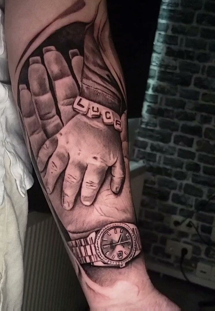 a man's arm with a cover-up tattoo of an elephant and a watch, bochum, germany