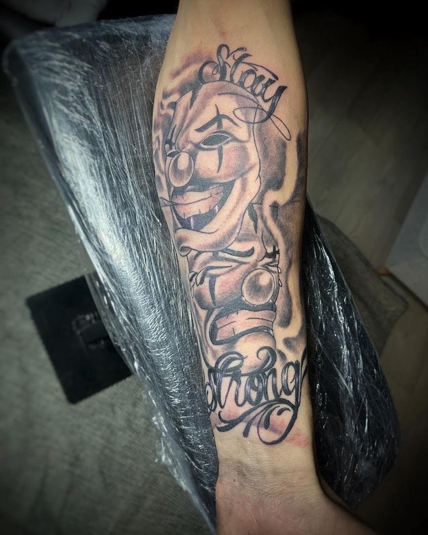 a cover-up tattoo with a lion and the words, oldenburg, germany