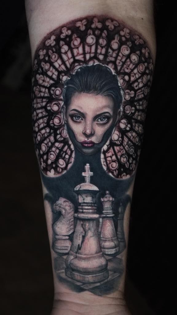 a narben tattoo of a woman with a chess piece, essen, germany