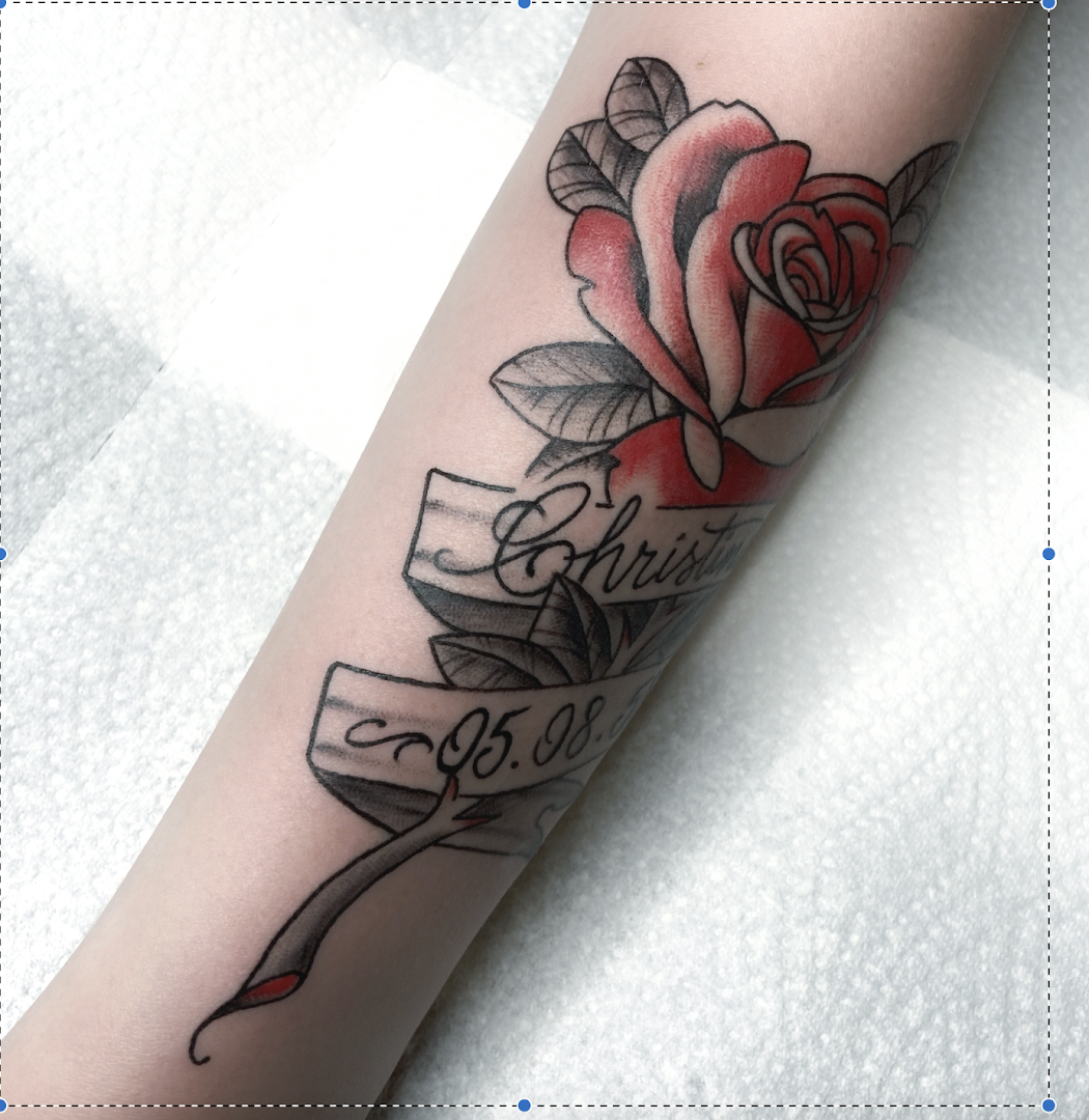 a rose cover-up tattoo on the forearm, berlin, germany