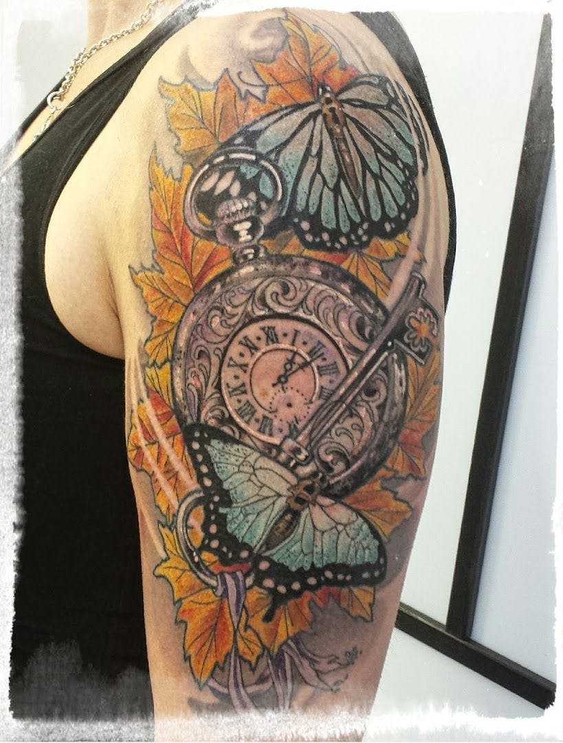 a cover-up tattoo with a clock and butterflies on it, rhein-erft district, germany