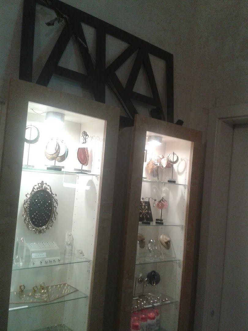 a display case with jewelry inside of it