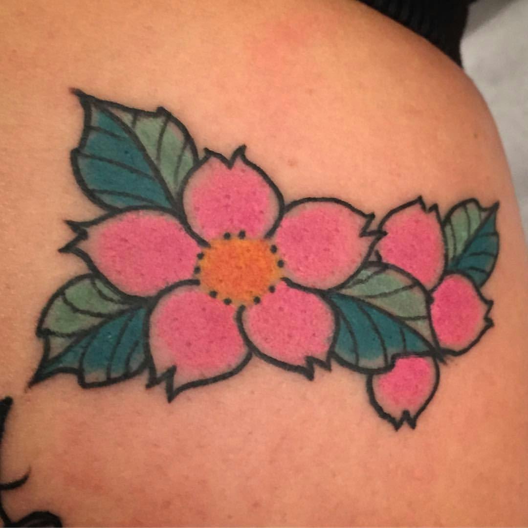 a narben tattoo with pink flowers on the side, tübingen, germany